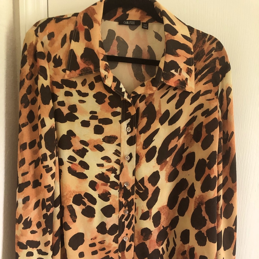 100% silk designer blouse. Comfortable & fashionable!